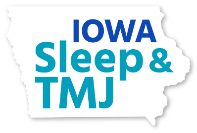 Iowa Sleep & TMJ logo in the shape of the state with blue lettering on top of it.