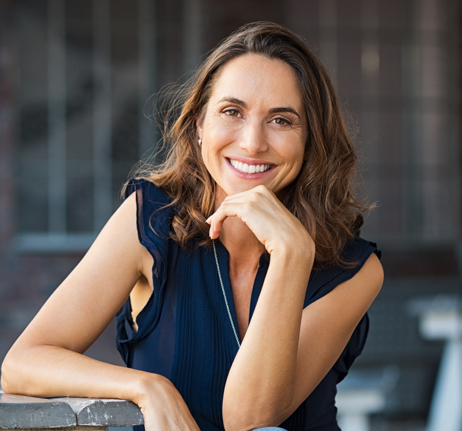 Happy, healthy woman smiling thanks to TMJ pain relief in Des Moines